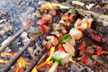 Kebabs cooked on campfire - those glowing embers